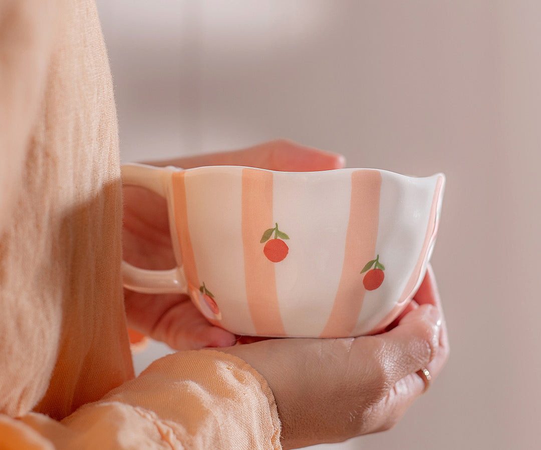 Tasse en céramique Rayures d’oranges de Moi d’abord rayée pêche et orange