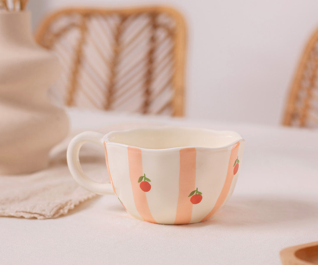 Tasse en céramique Rayures d’oranges de Moi d’abord rayée pêche et orange