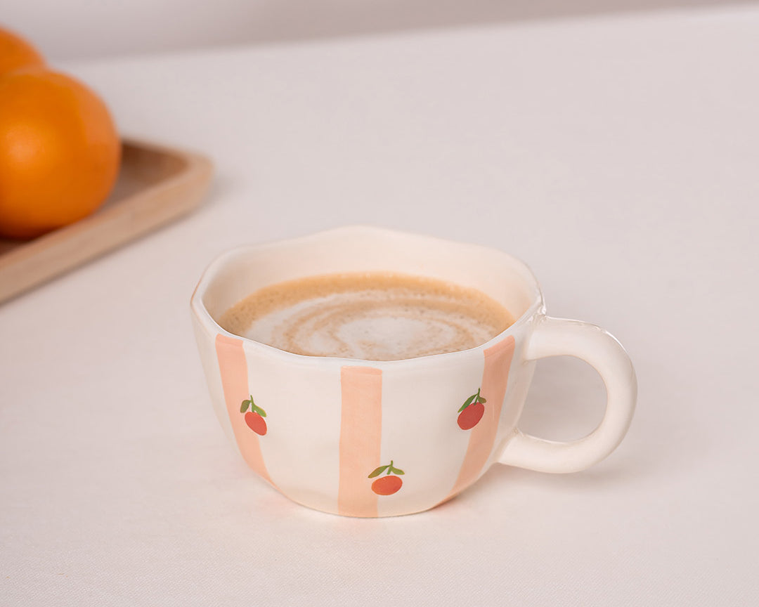 Tasse en céramique Rayures d’oranges de Moi d’abord rayée pêche et orange